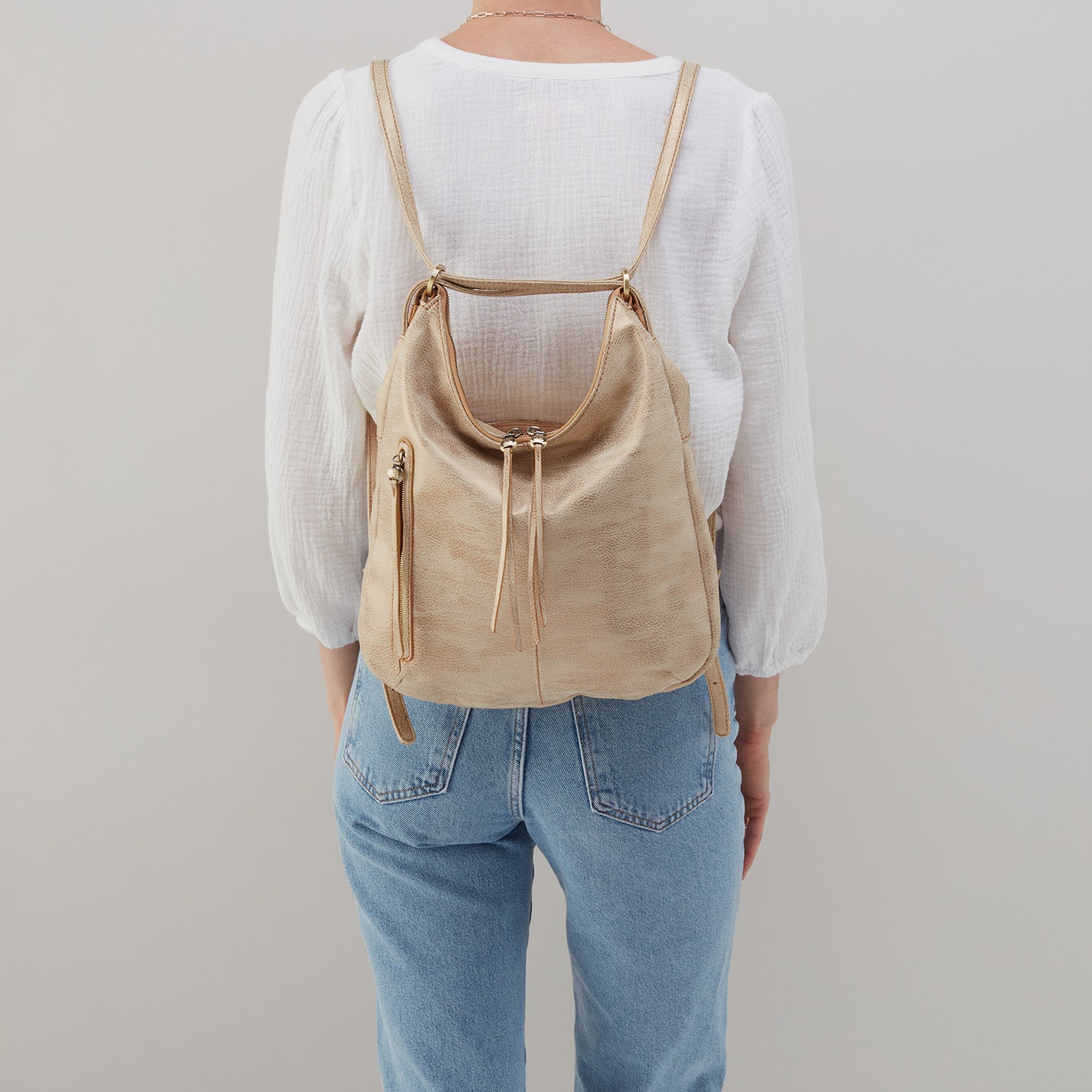 Merrin Convertible Backpack in Metallic Leather - Gold Leaf - Image 4